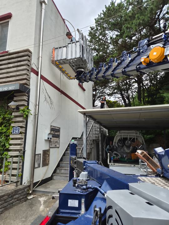 건물 주변의 붐과 작업 공간 · 사진 0208